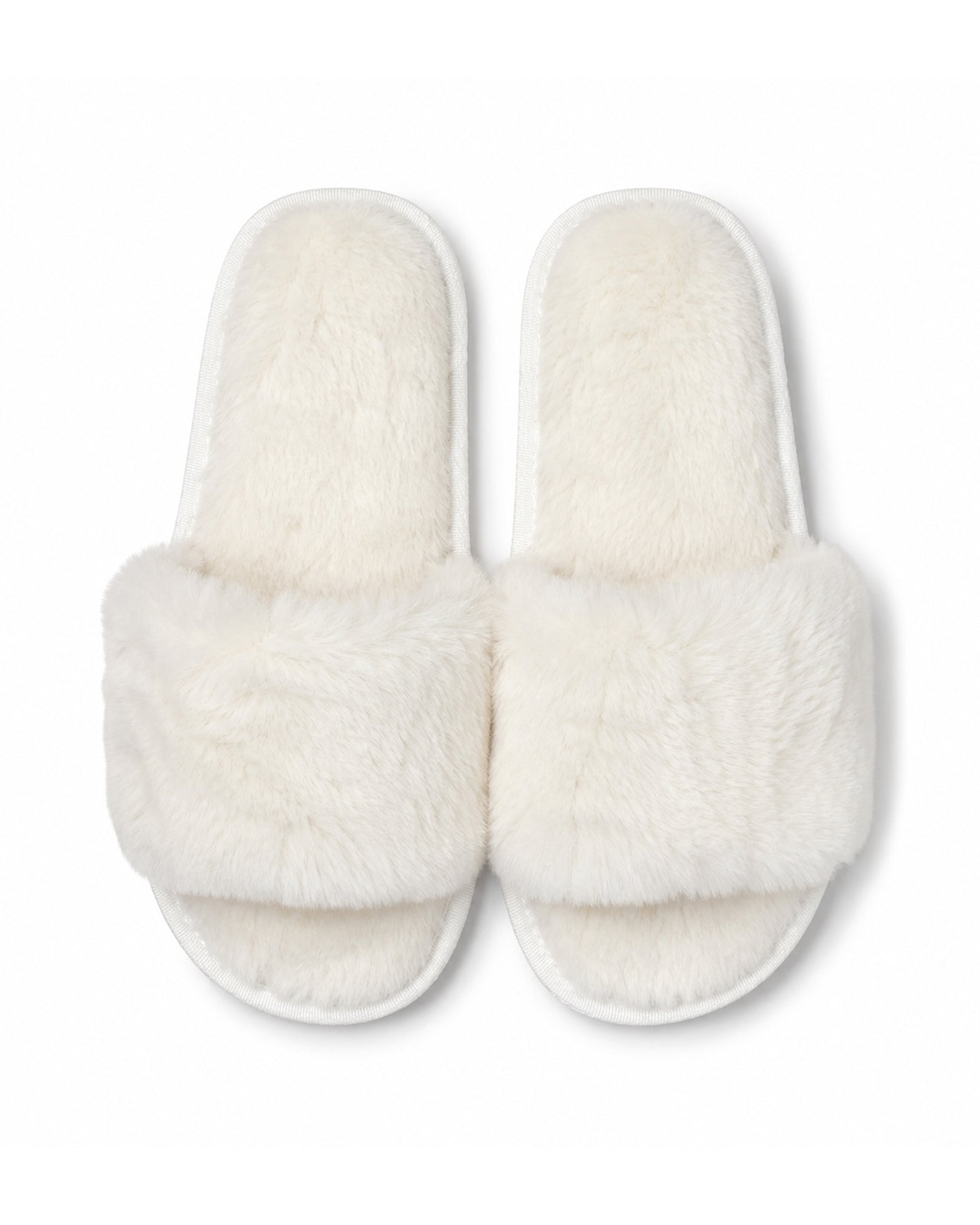Ivory wholesale slippers in bulk with non-slip soles. 