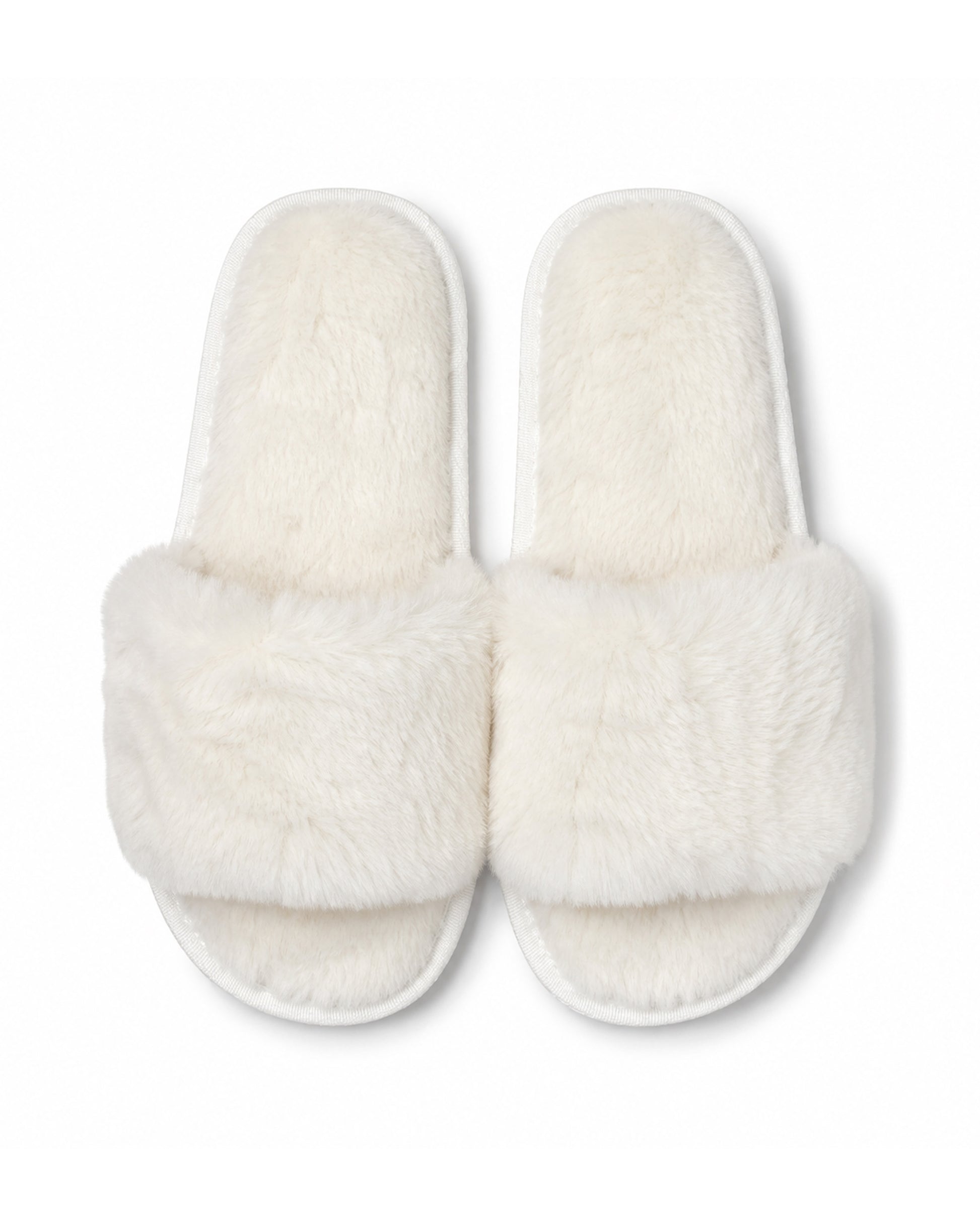 Ivory wholesale slippers in bulk with non-slip soles. 