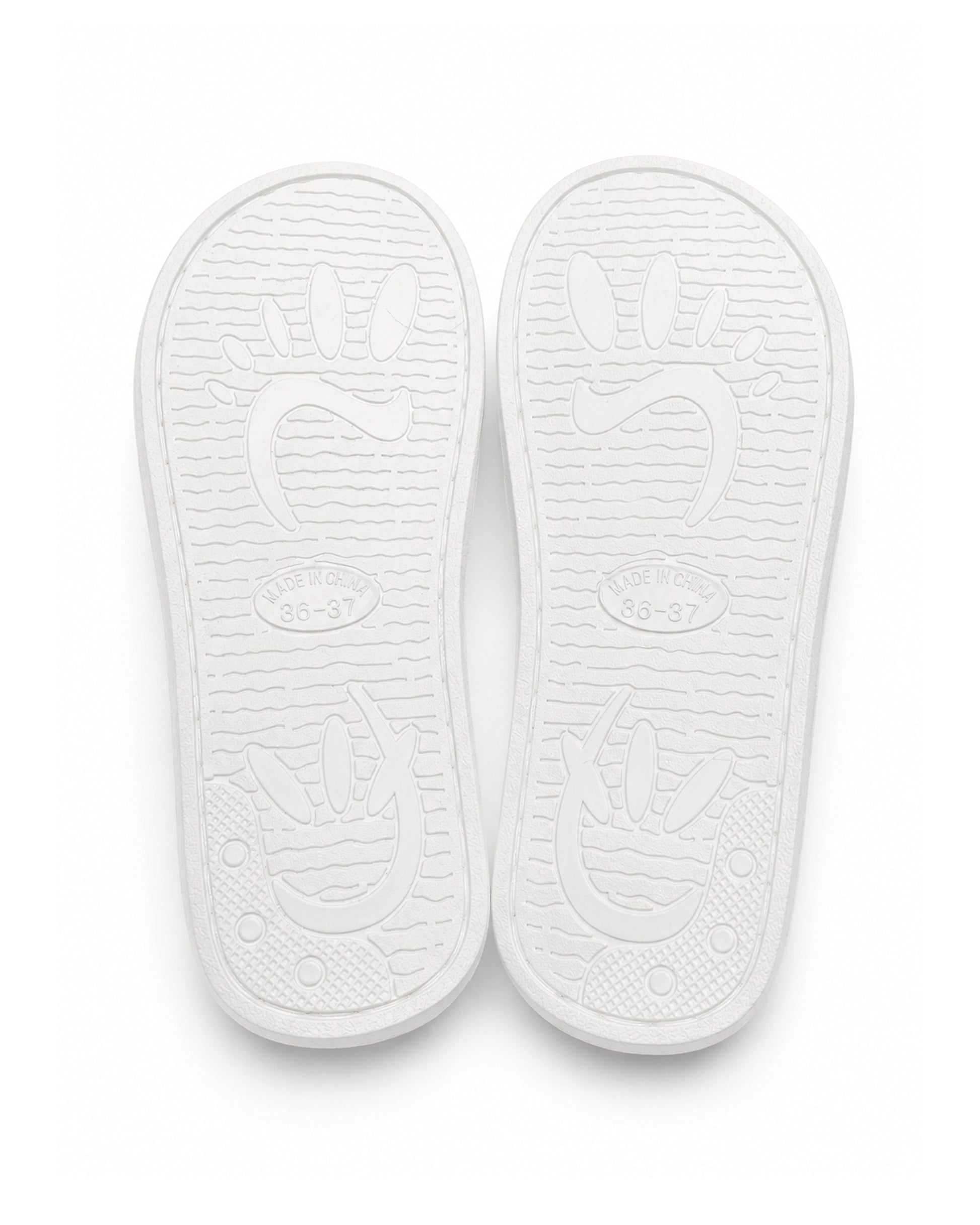 Ivory fluffy slippers with slip resistant soles.