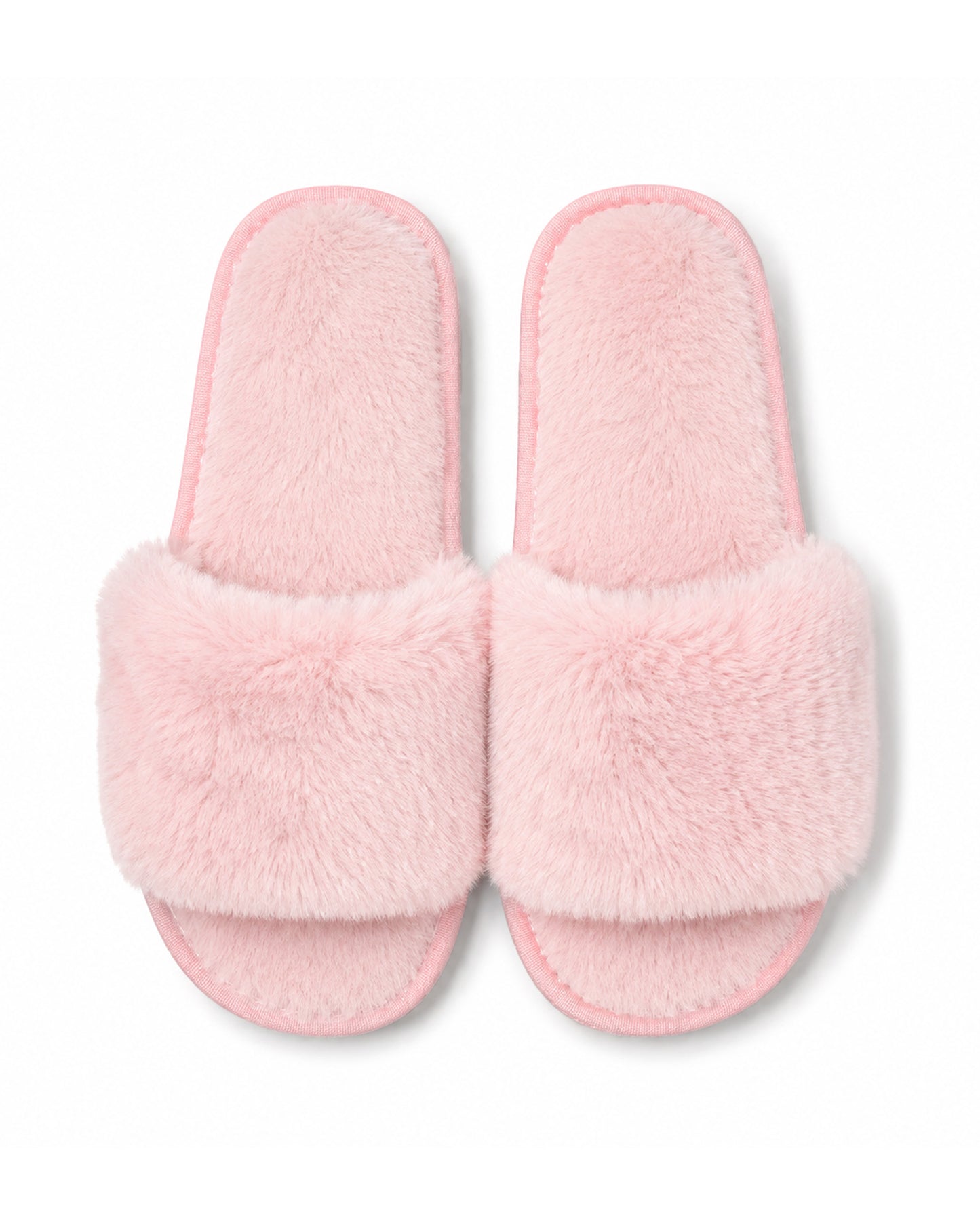 Pink wholesale slippers in bulk with non-slip soles. 