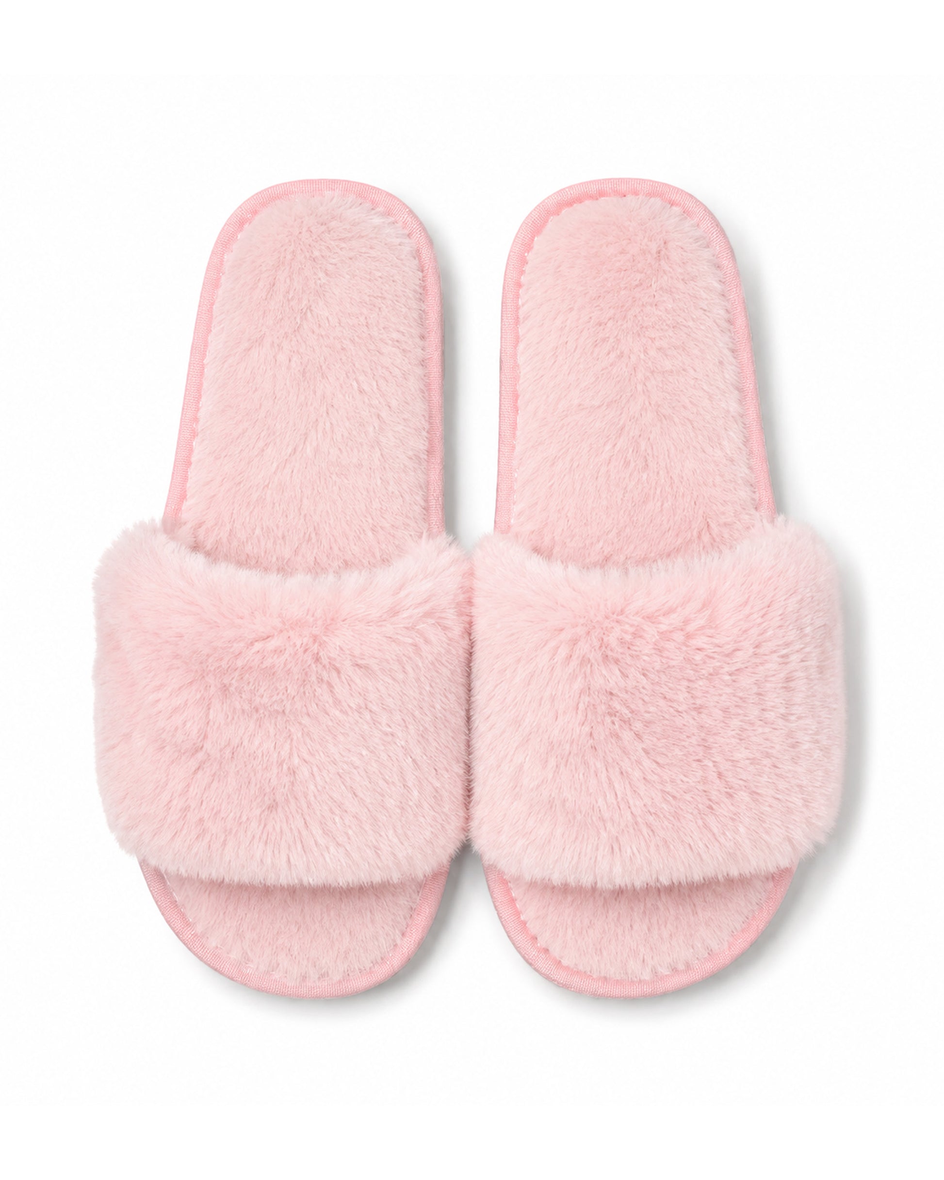 Pink wholesale slippers in bulk with non-slip soles. 